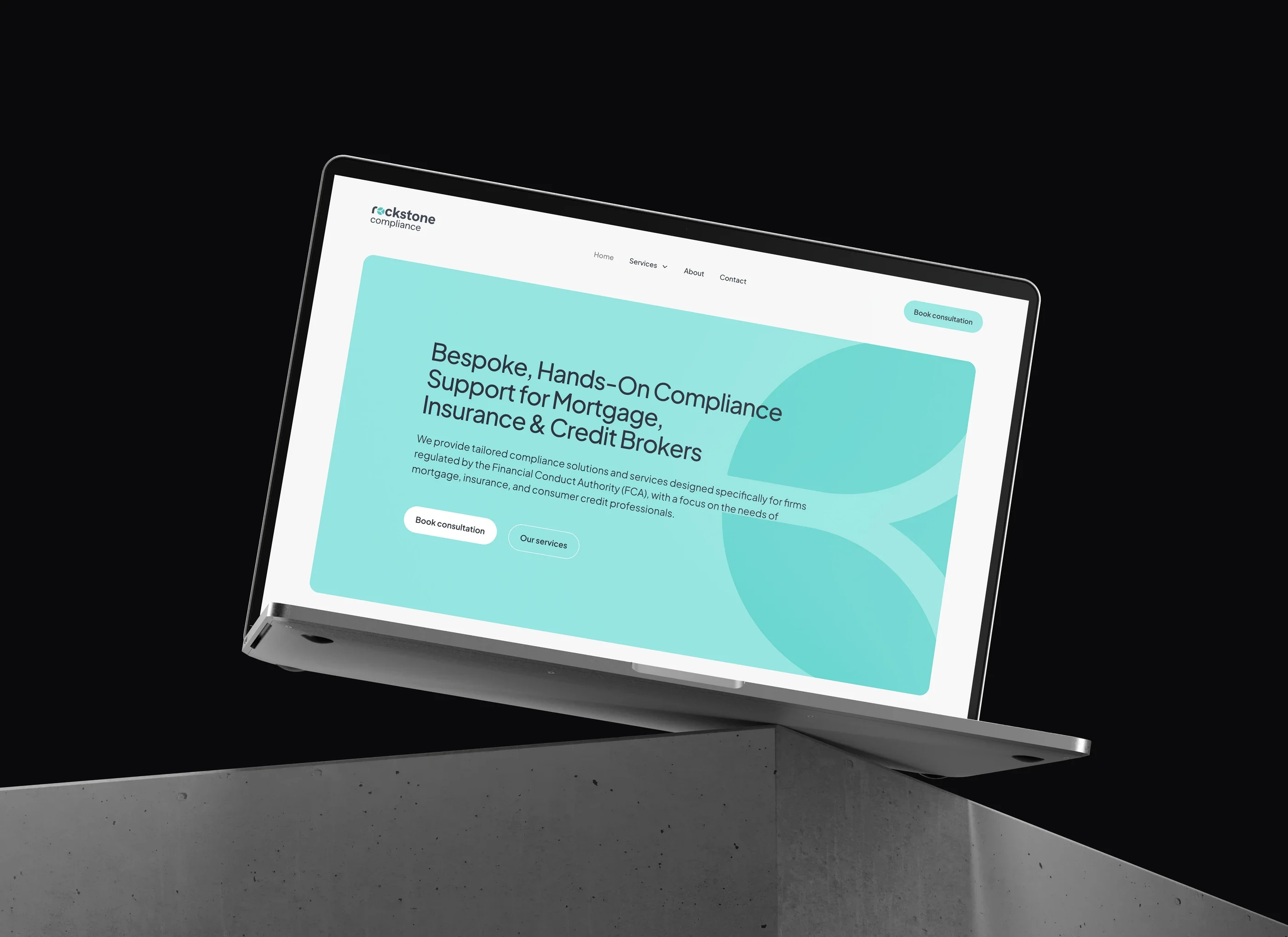 The Rockstone Compliance home page on a laptop, against a dark background