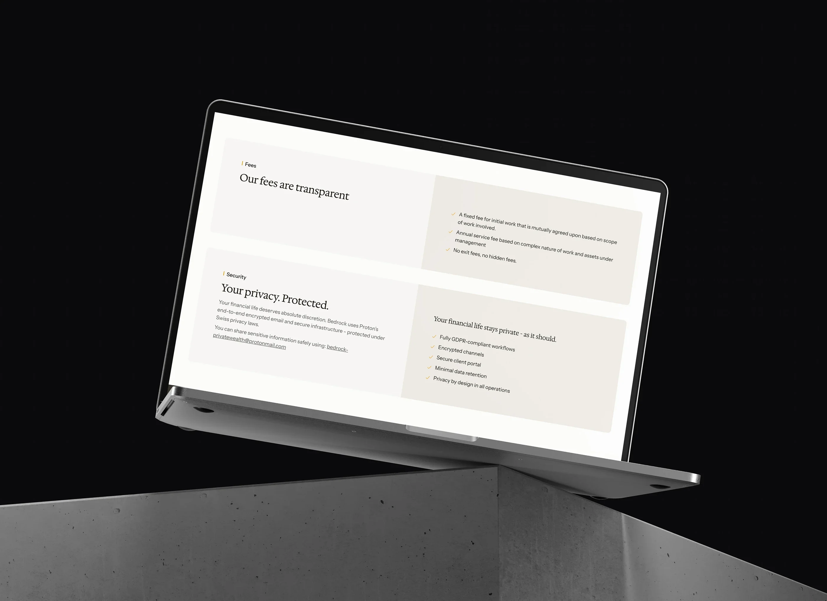 The fees and privacy section on a laptop against a dark background