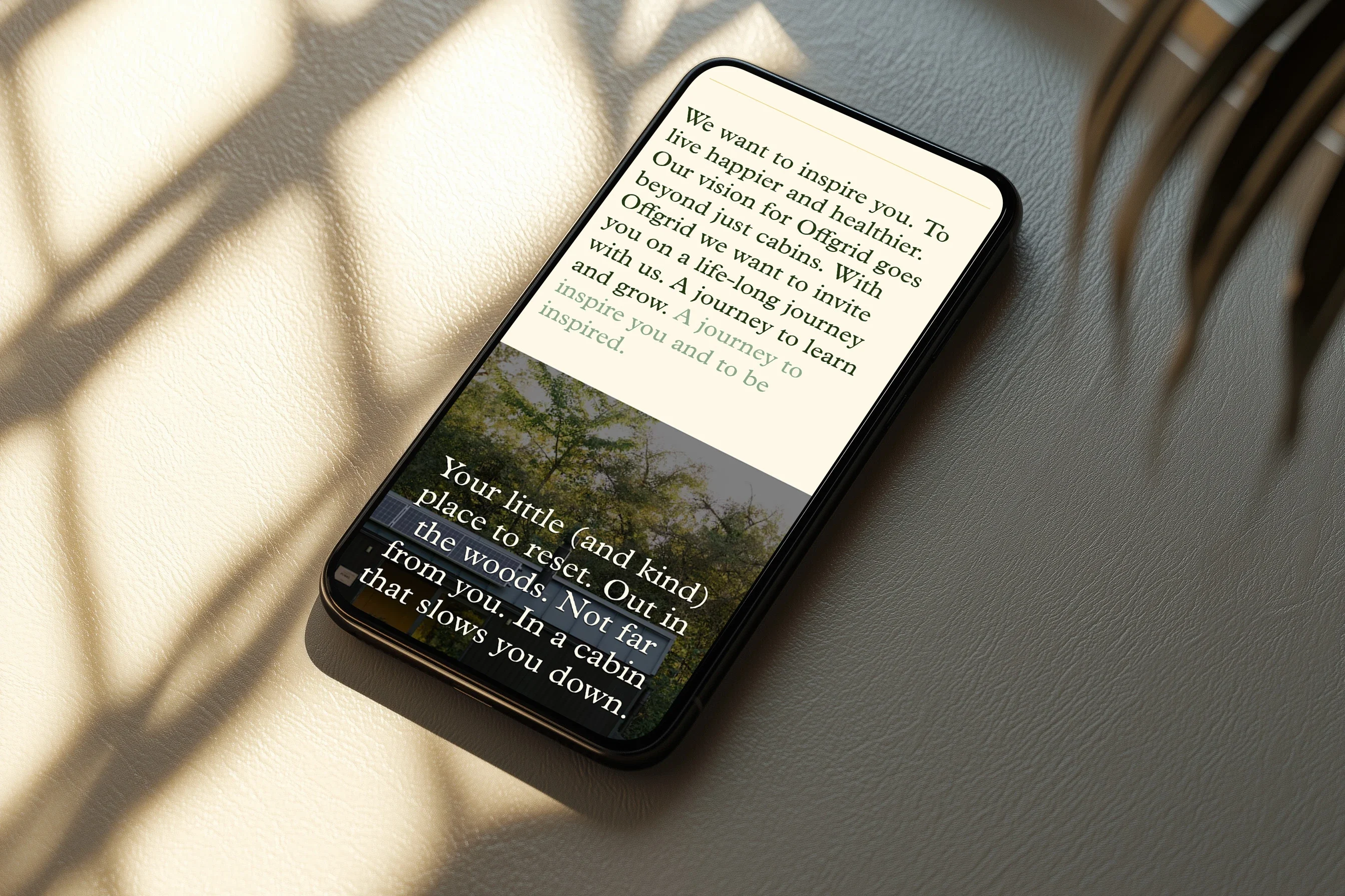'Your little (and kind) place to reset' on a phone, in sunlight