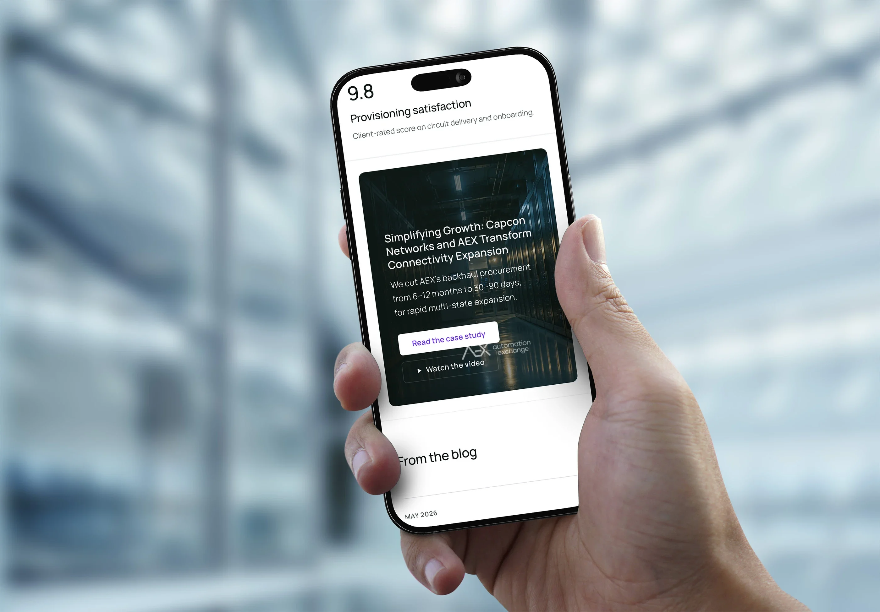 The provisioning satisfaction score and a customer story on a phone held in one hand