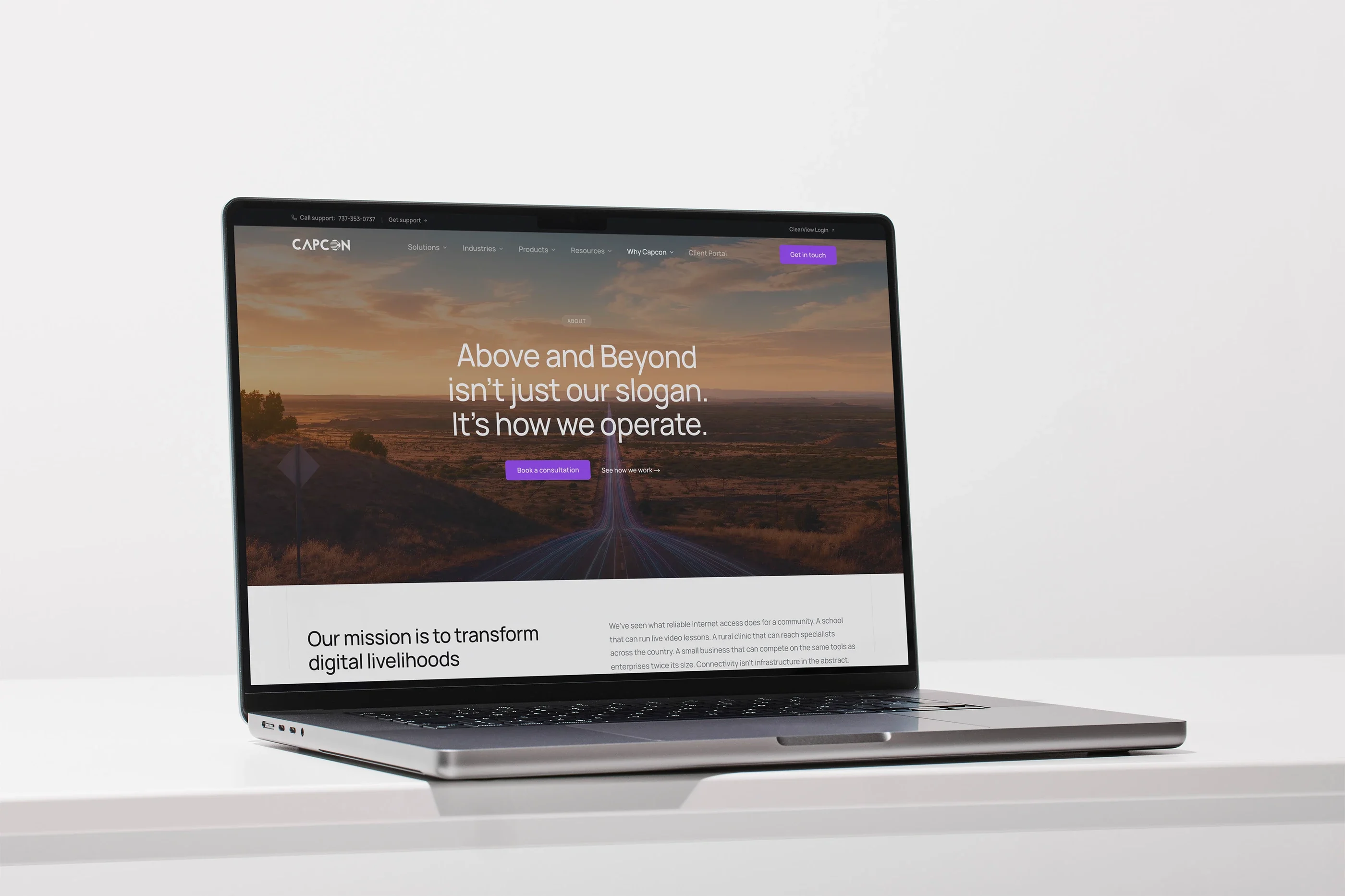 The About page on a laptop: 'Above and Beyond isn't just our slogan. It's how we operate.'