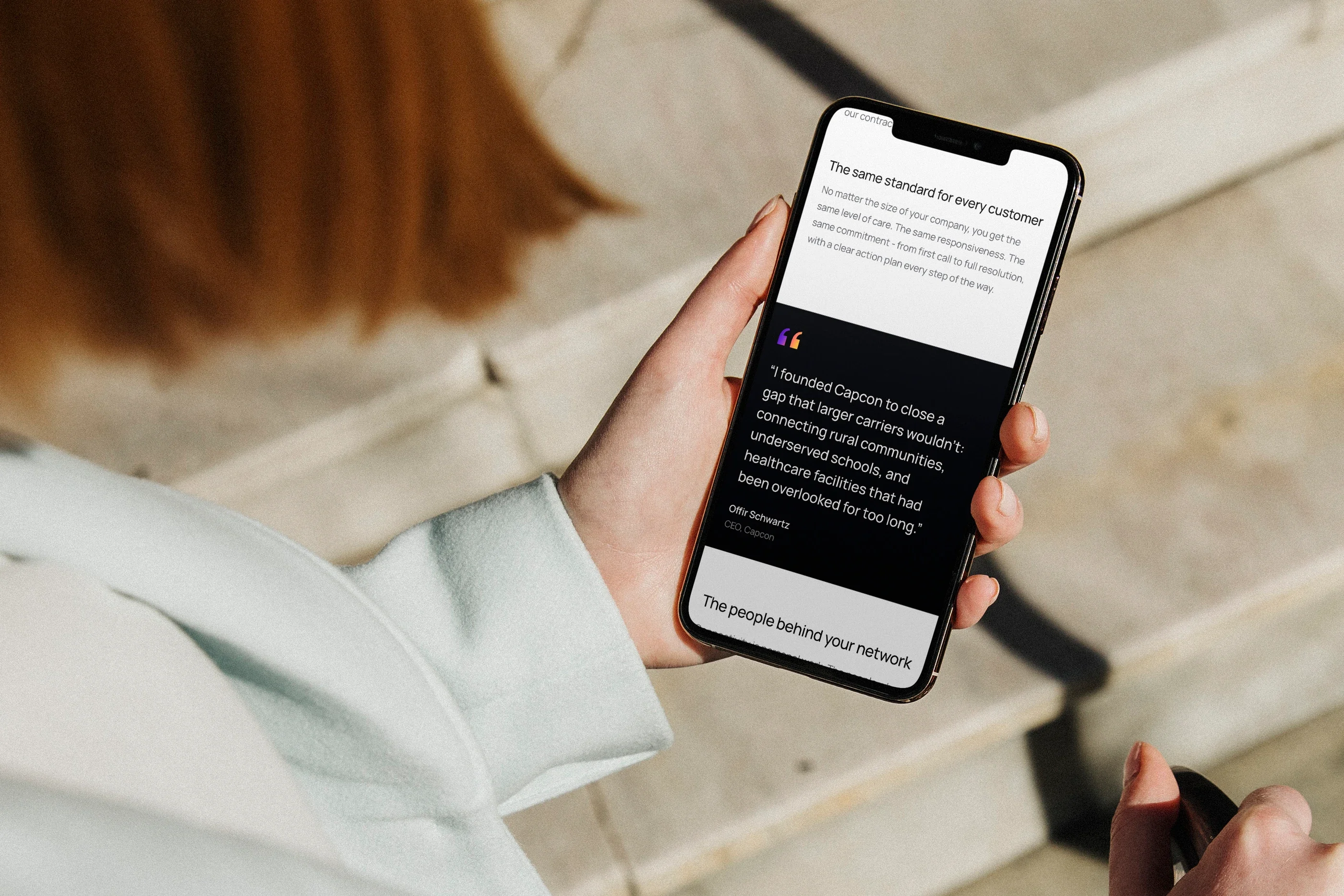 The founder's quote on the About page, on a phone