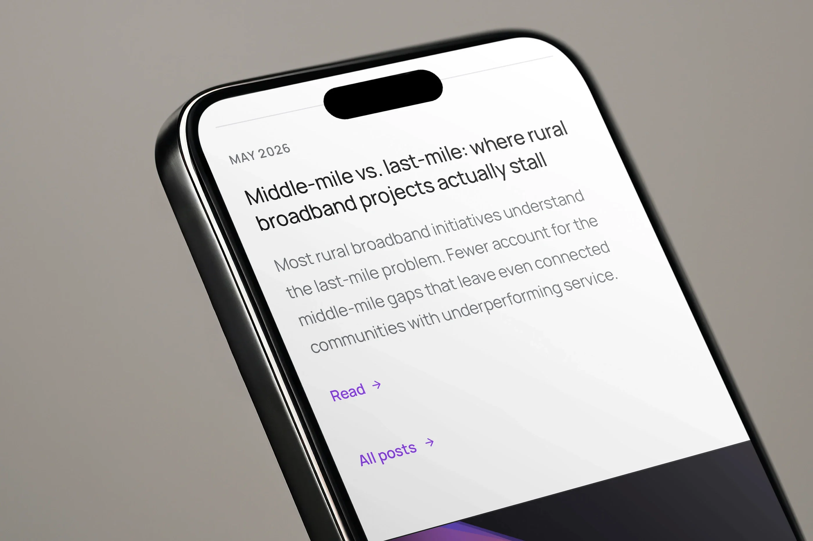 A blog post on the web-centric enterprise page, 'Middle-mile vs. last-mile: where rural broadband projects actually stall', on a phone, close up