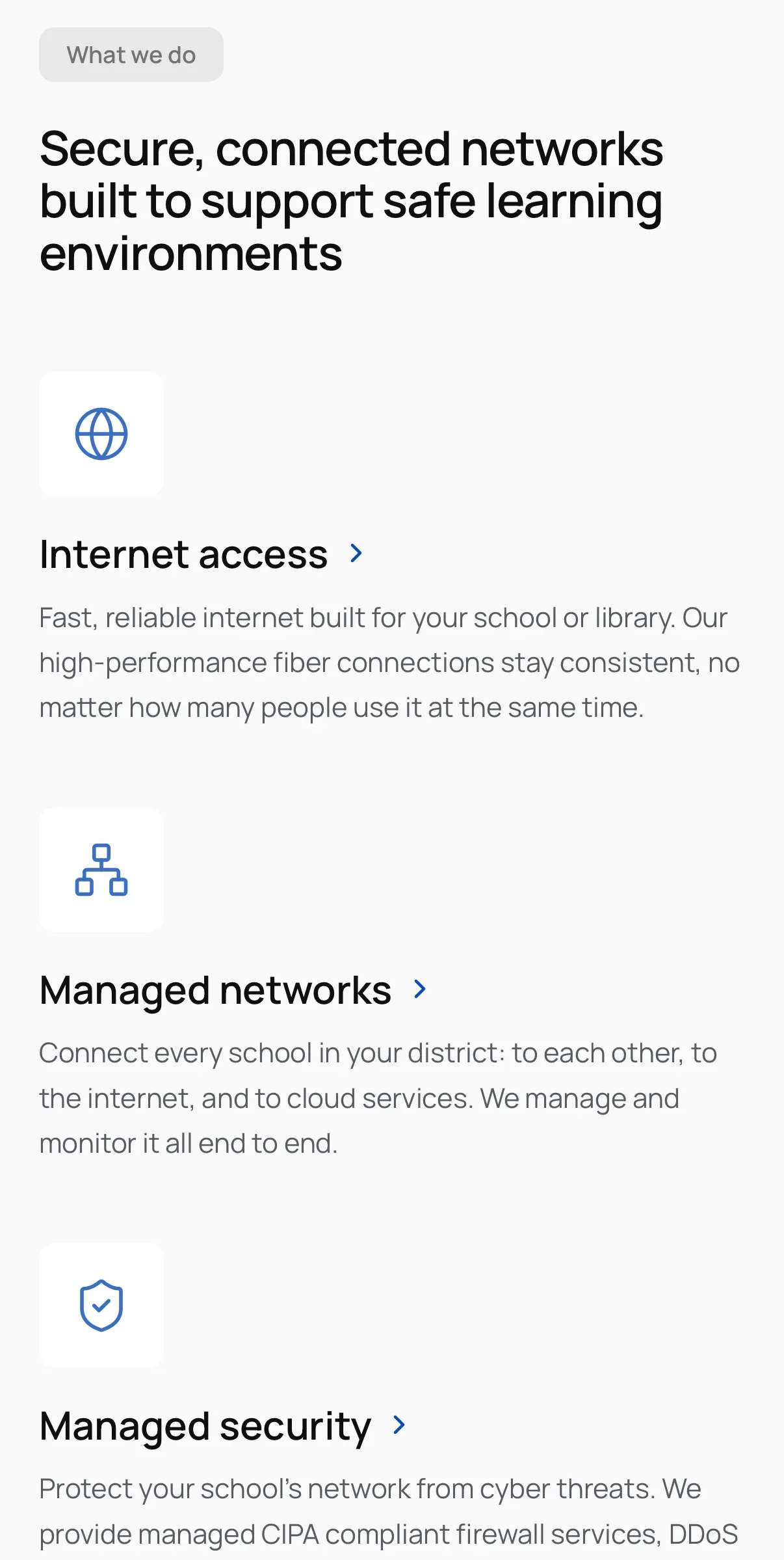'Secure, connected networks built to support safe learning environments', with the services list, on a phone