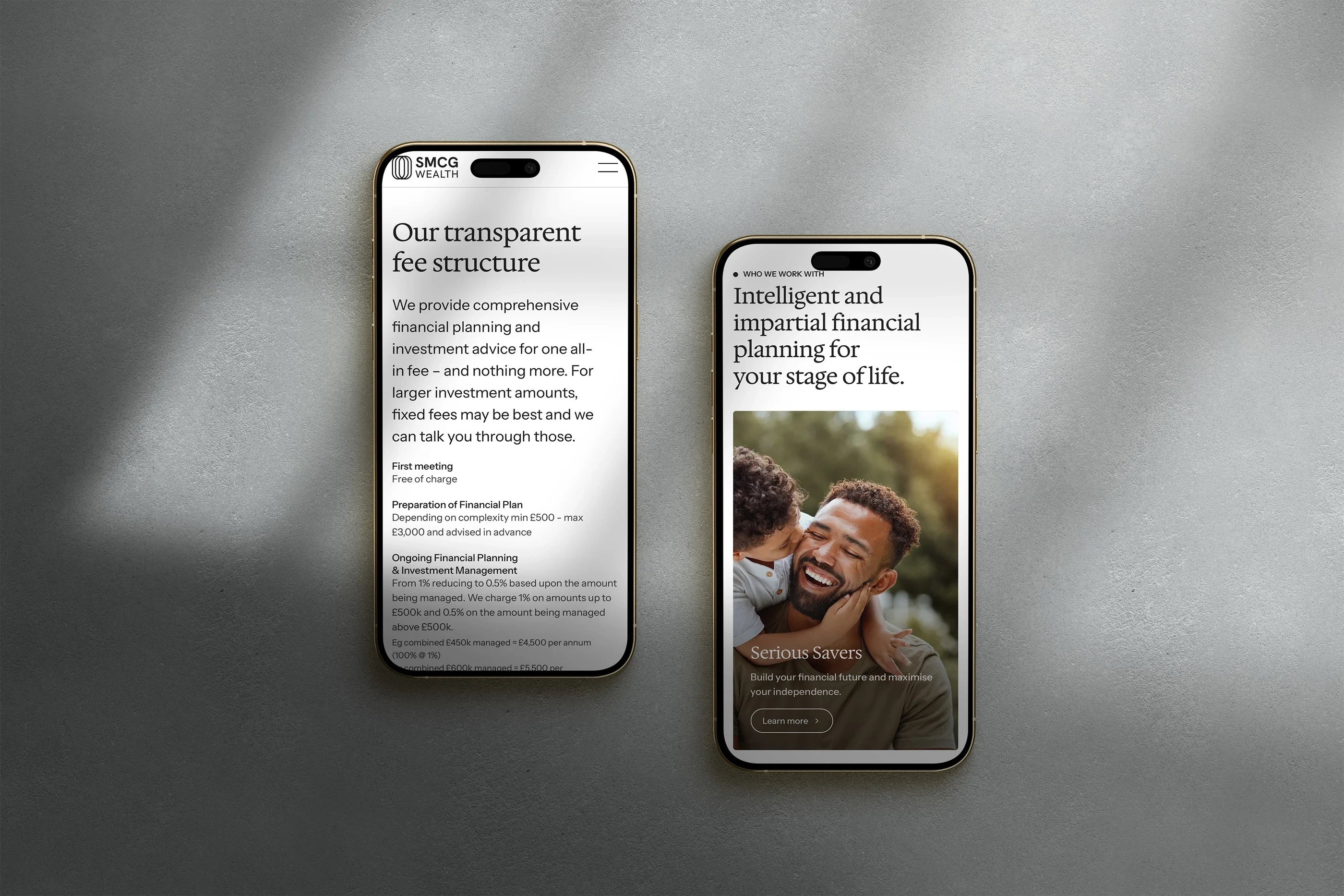 Two phones on grey stone: the fees page and the home page of SMCG Wealth